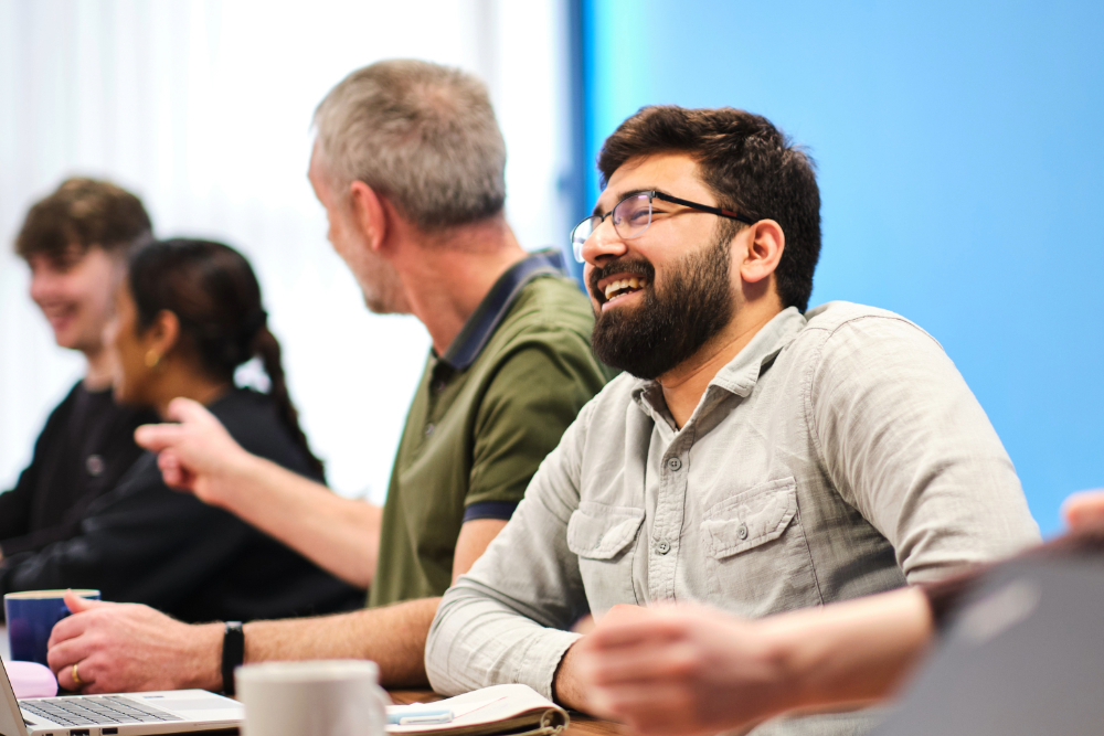 Group of researchers laughing together